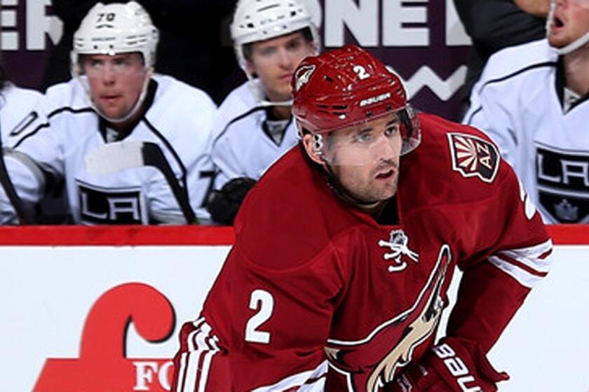 Jamie McBain was playing for the Coyotes against the Kings in a preseason game but the veteran defenseman will soon be joining their ranks.