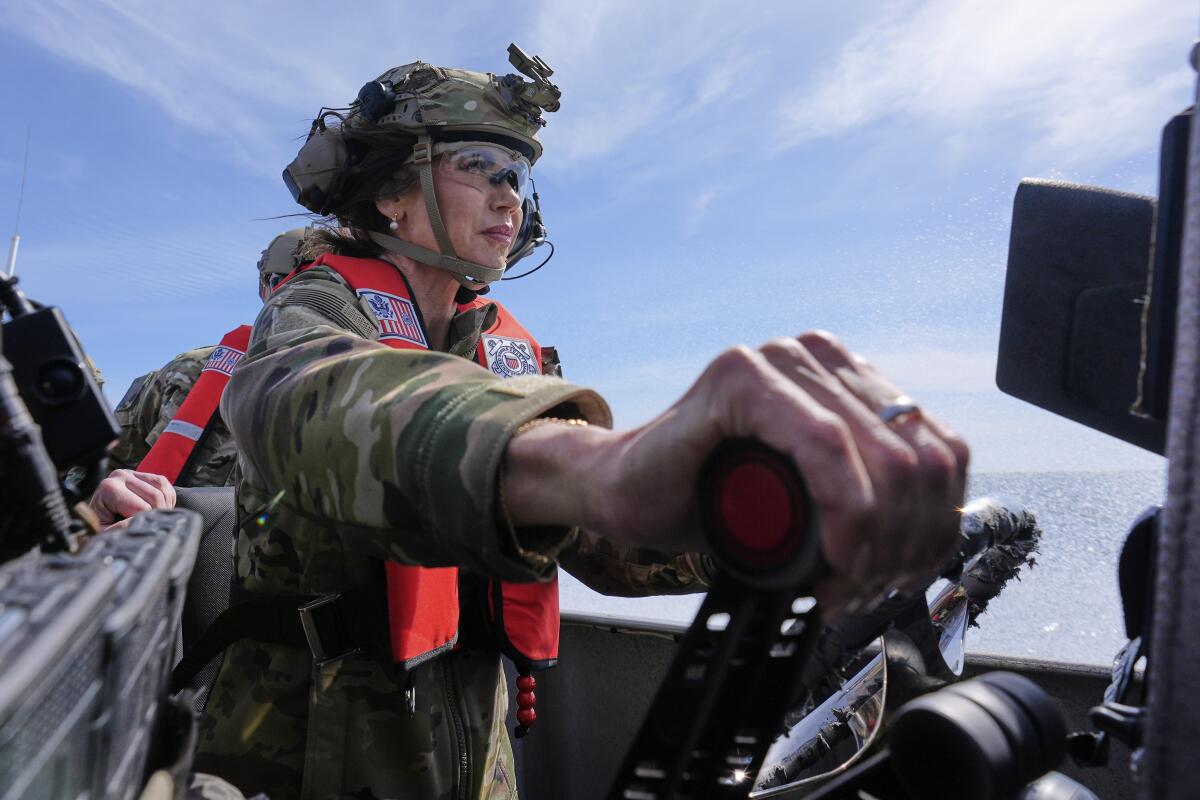 Homeland Security Secretary Kristi Noem pilots a U.S. Coast Guard Response Boat.