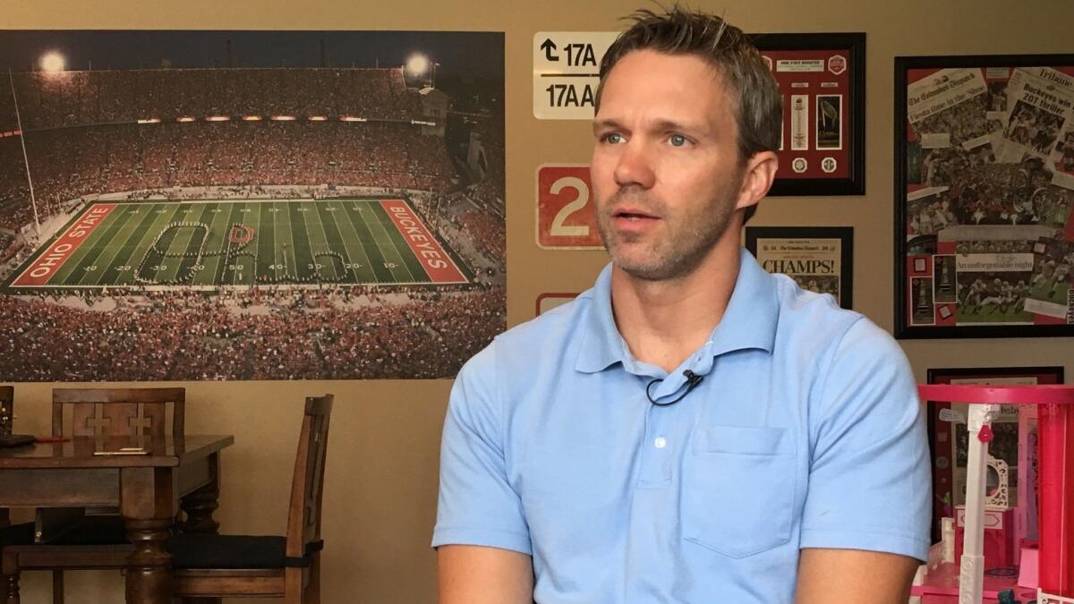 Brian Garrett speaks during an interview at his home in Powell, Ohio. Garrett said he both witnessed and experienced sexual abuse by Dr. Richard Strauss while handling administrative work at the doctor's off-campus clinic briefly in 1996.