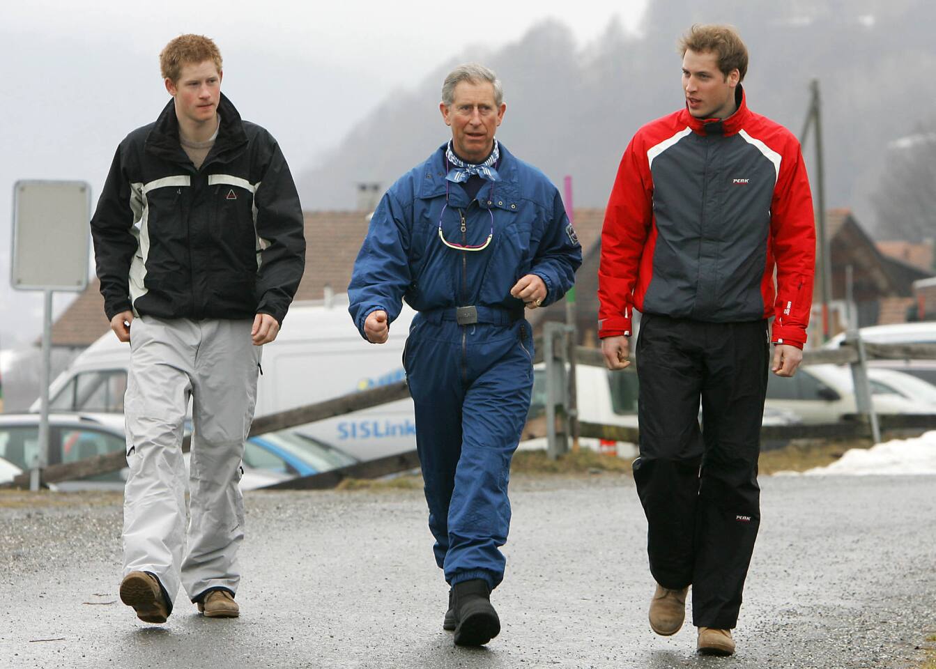 Britain's Prince Charles poses with Prince Williams and Prince Harry