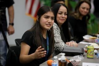 MAYWOOD, CA - FEBRUARY 16: Salma Rodriguez, ninth-grade, addresses Superintendent Alberto M. Carvalho, Los Angeles Unifed School District, at a lunch break while Superintendent Carvalho tours Maywood Center For Enriched Studies (MaCES) Magnet school on Wednesday, Feb. 16, 2022 in Maywood, CA. Superintendent Carvalho conducted a two-day school tour, visiting special programs and classrooms at sites across the District. (Gary Coronado / Los Angeles Times)
