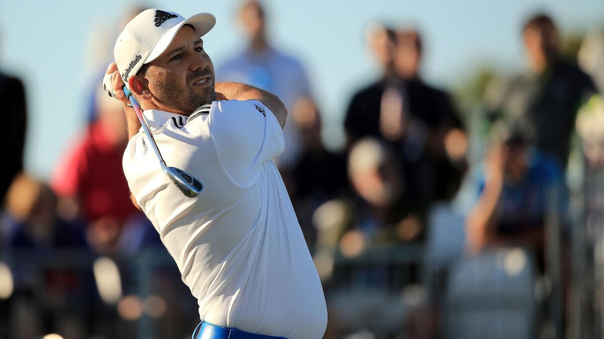 Sergio Garcia of Spain follows through on his tee shot at No. 17 during the first round of the Honda Classic on Thursday.