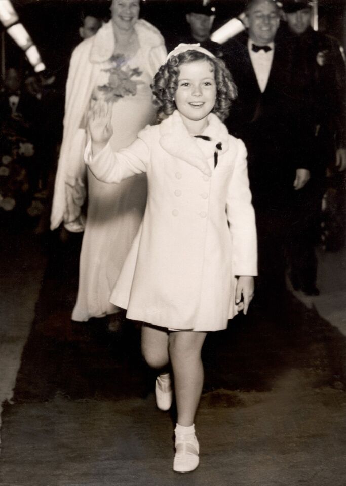 Shirley Temple arrives at her first major premiere for the film "Wee Willie Winkie" in Hollywood.