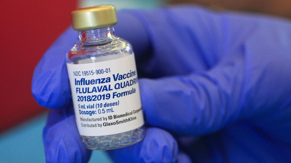 A vial of flu vaccine at a San Diego County public health center in 2018.