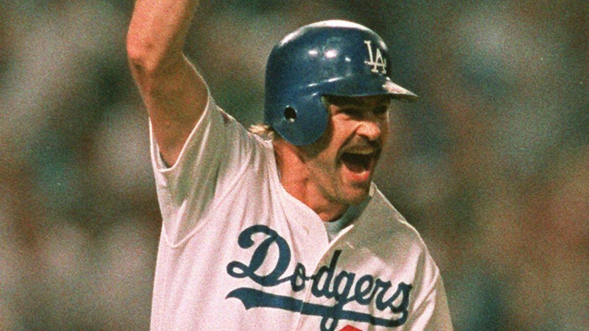 Kirk Gibson rounds the bases after hitting a two-run home run against the Oakland Athletics to win Game 1 of the 1988 World Series.