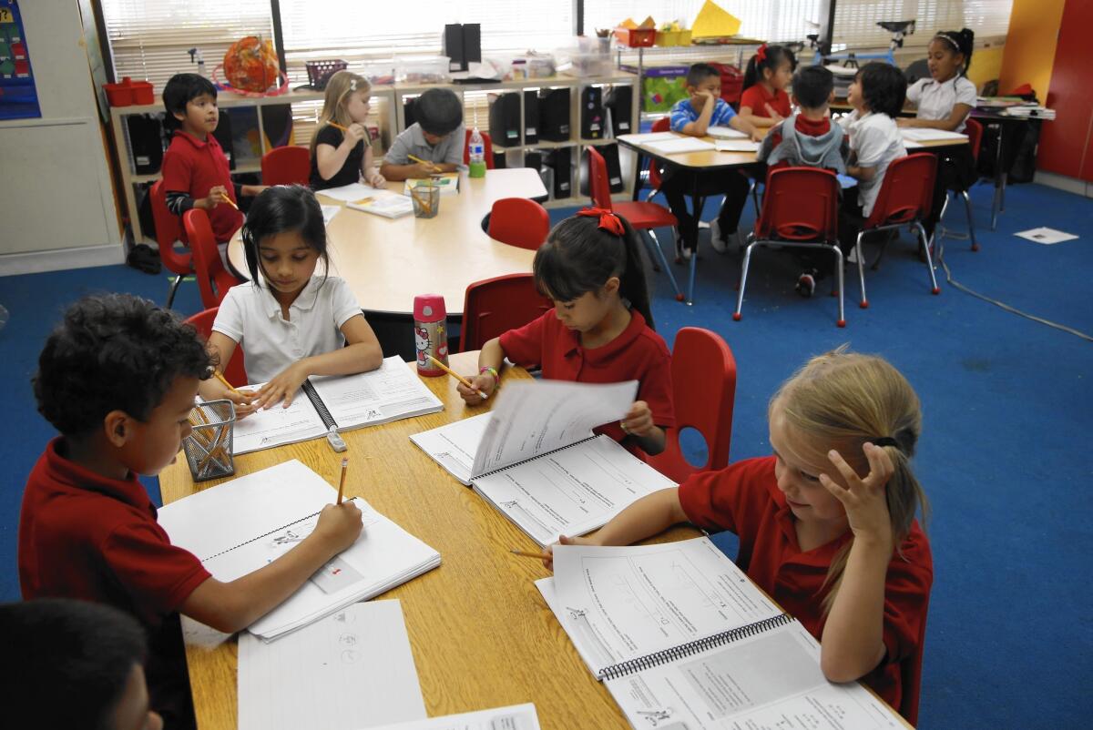 Students work in a first-grade classroom at Metro Charter Elementary.