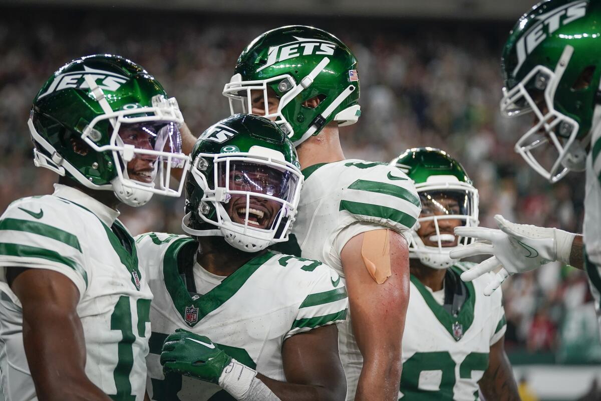 New York Jets' players celebrate after a touchdown against the Kansas City Chiefs.