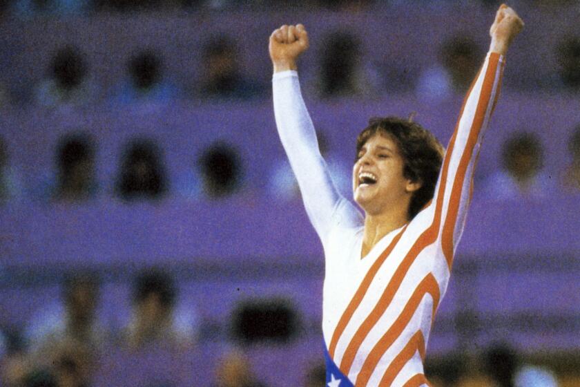 Mary Lou Retton became the star of the 1984 Olympics in Los Angeles, winning the gold medal in all-around competition.