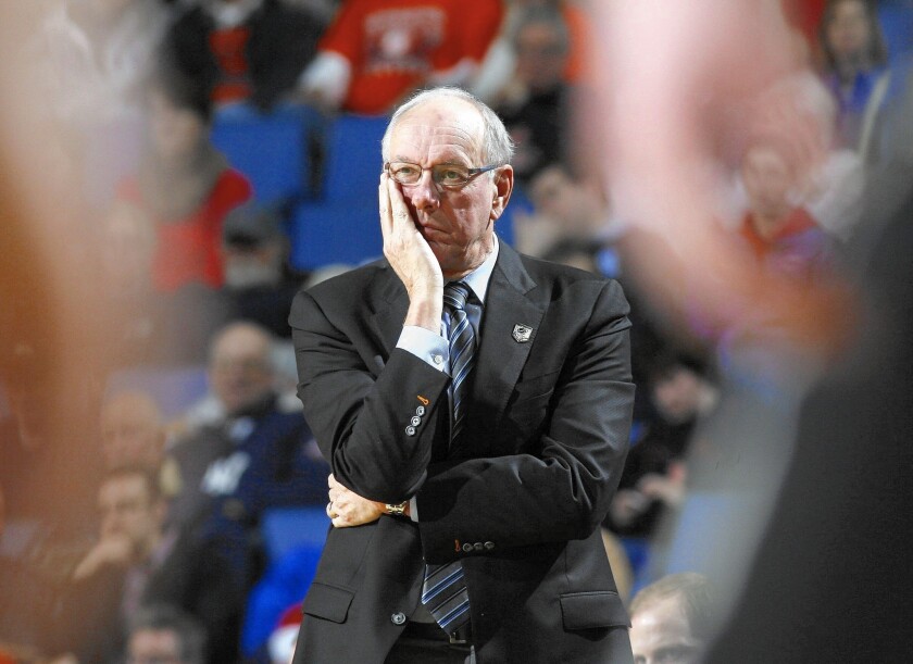 An NCAA report said that Syracuse University's athletic department engaged in academic fraud over 10 years to keep its academically underperforming stars in the game. The fraud was allegedly managed by the basketball operations director who reported to head basketball coach Jim Boeheim, above.
