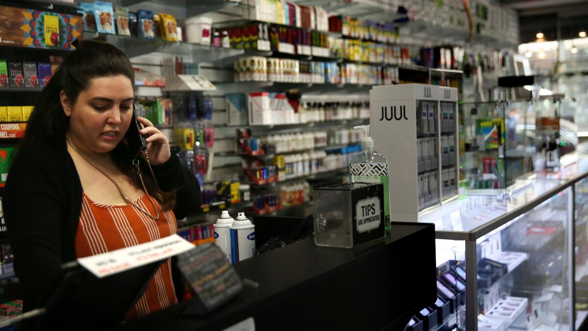 L.A. smoke shop owner fights for essential business status - Los Angeles Times L.A. smoke shop owner fights for essential business status - Los Angeles Times