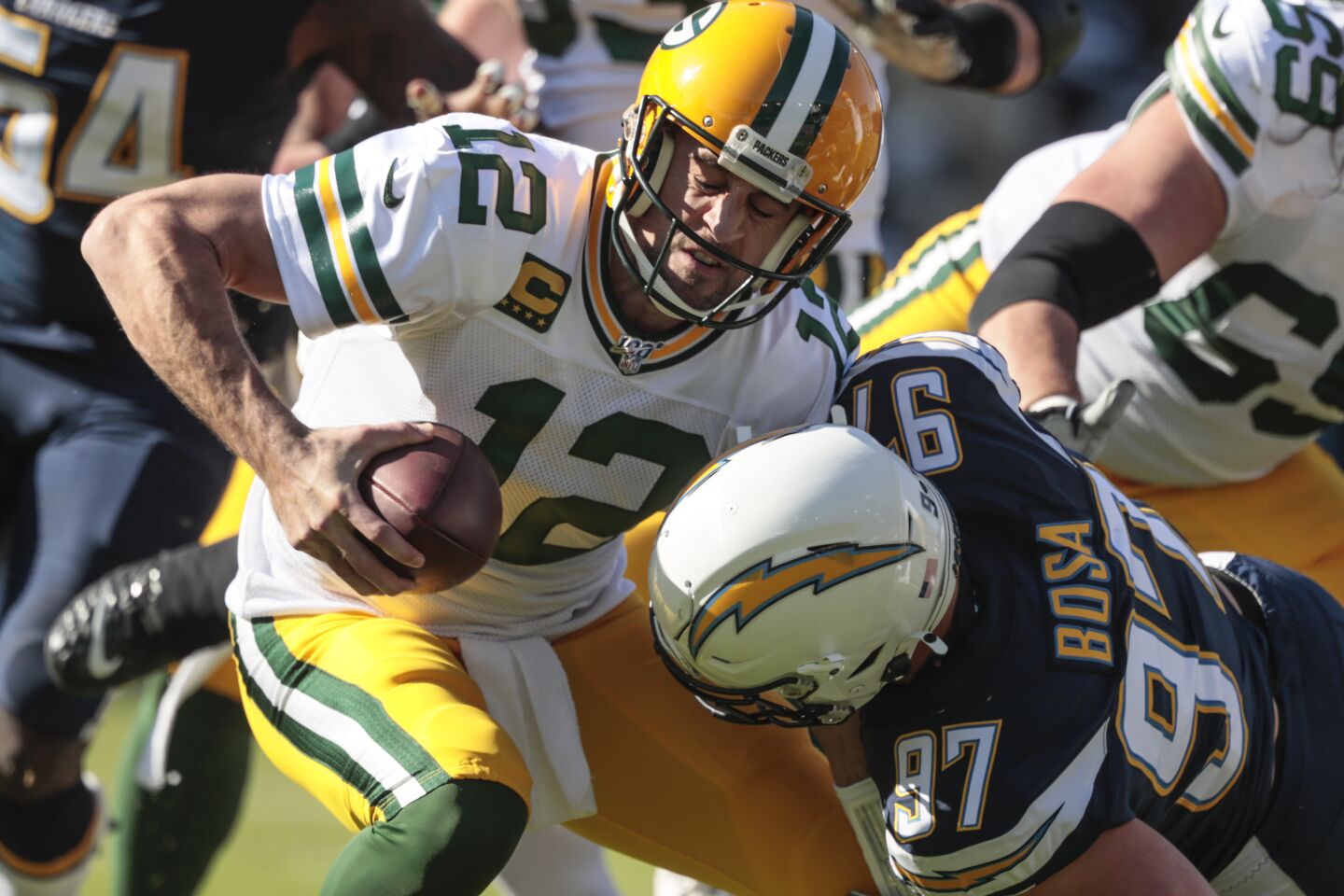 Chargers defensive end Joey Bosa sacks Packers quarter Aaron Rodgers.