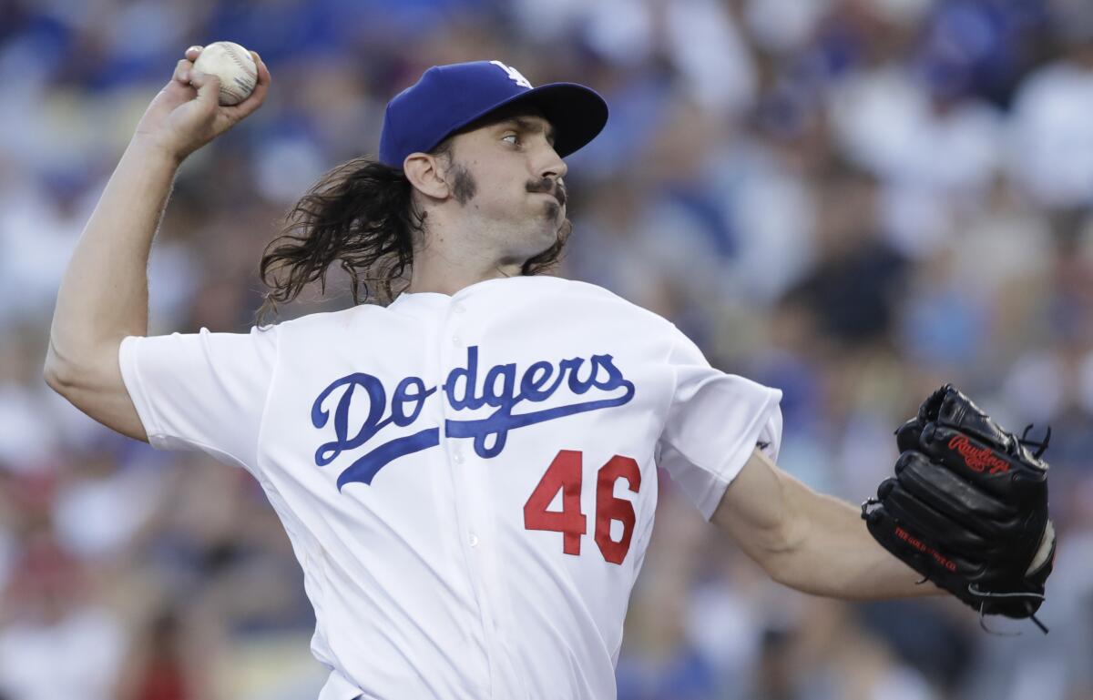 Dodgers pitcher Tony Gonsolin delivers against the St. Louis Cardinals on Monday.