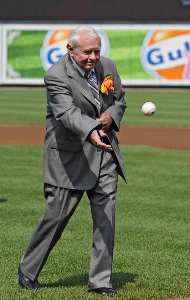 Former Orioles manager Earl Weaver throws out the first pitch during a pre-game ceremony.