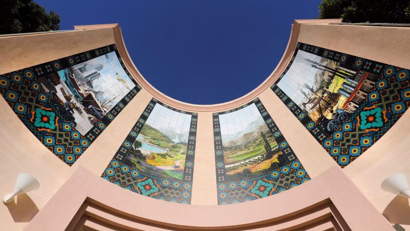 The Committee of One Hundred has donated temporary murals for the front of the San Diego Automotive Museum in Balboa Park. The historic preservation group wants to raise $200,000 for permanent replicas of the 1935 art pieces.