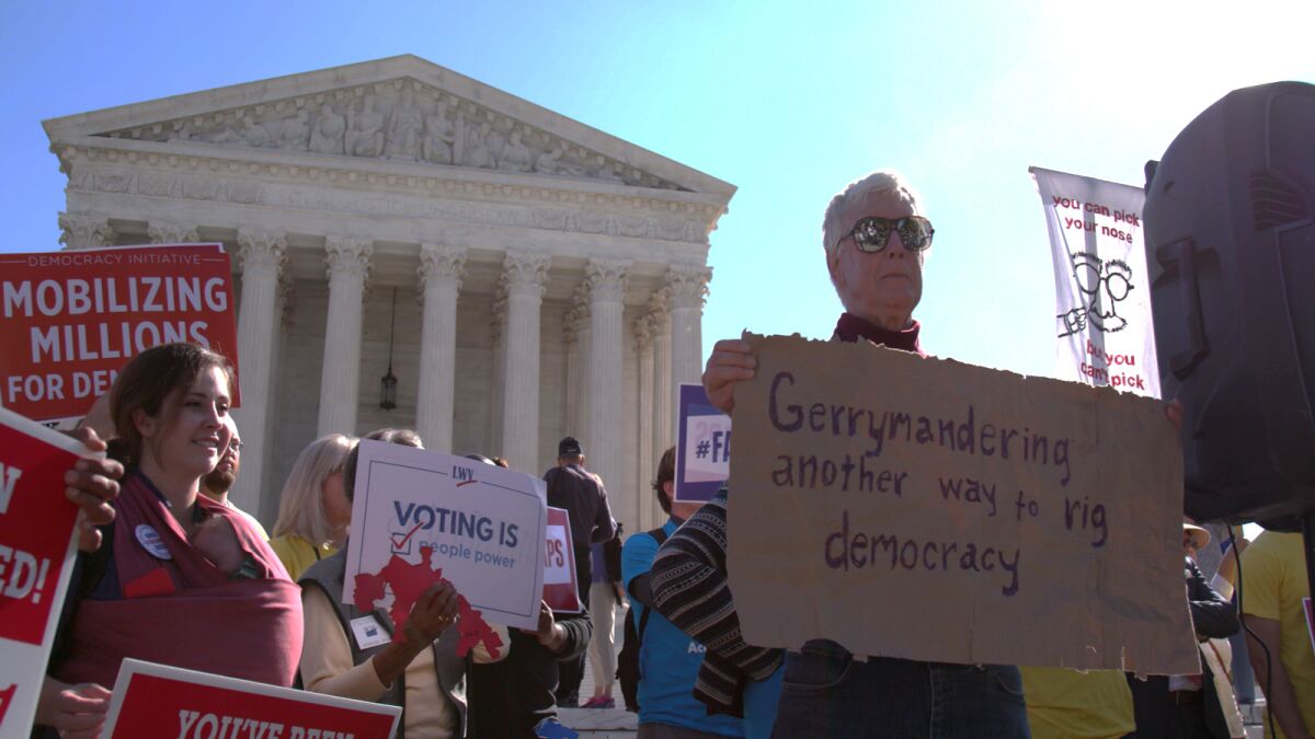 Demonstrators protest gerrymandering in the documentary 'Slay the Dragon'