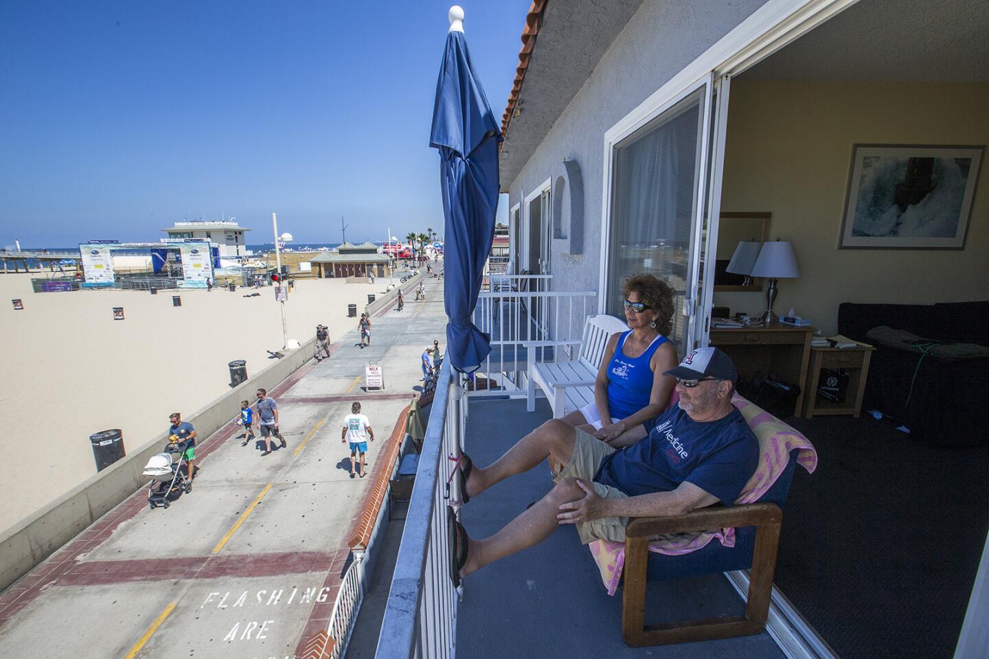 Carmen and Marty Brussels of Phoenix have been vacationing at the Sea Sprite Motel in Hermosa Beach for many years. The motel's owners are bombarded by offers from large chains and others to buy the property.