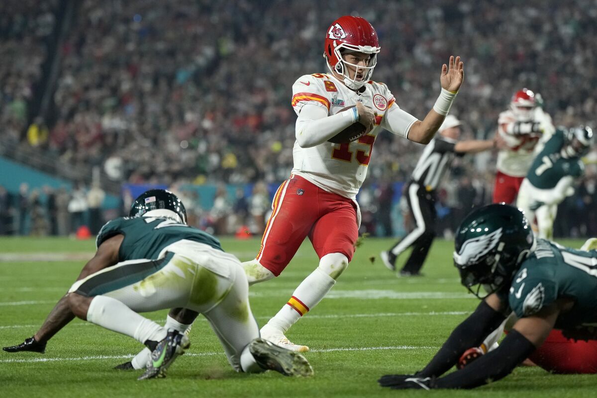 Kansas City Chiefs quarterback Patrick Mahomes scrambles against the Philadelphia Eagles.