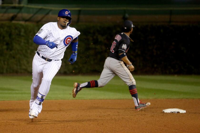 Jorge Soler runs to third base for a triple in the seventh inning Friday, Oct. 28, 2016, in Game 3 of the World Series at Wrigley Field.