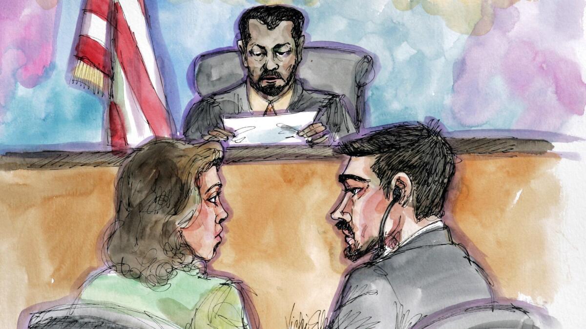 Hamid Hayat, right, and his attorney Wazhma Mojaddidi listen as U.S. District Judge Garland E. Burrell Jr. reads the jury's guilty verdict in his terror trail in a 2006 artist's sketch. A magistrate has recommended overturning Hayat's conviction.