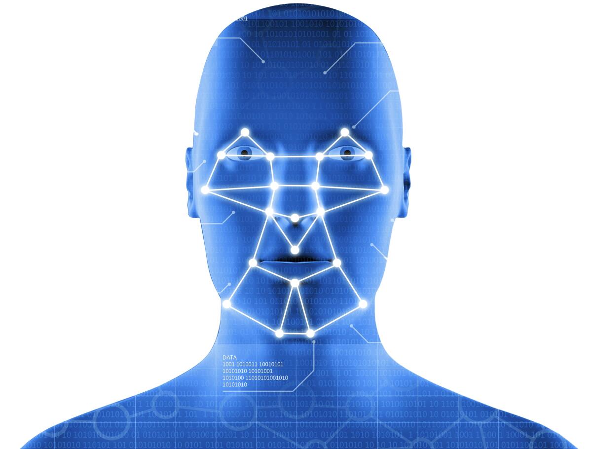 A facial recognition system showing a blue interface with a human head.