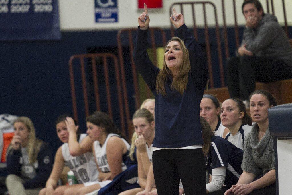 Newport Harbor High coach Shelly VanDusen gives instructions to her team during a game on Tuesday.