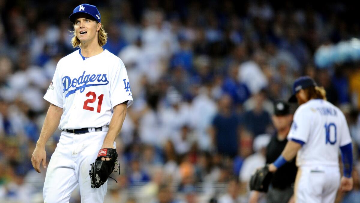 Dodgers starter Zack Greinke reacts after Mets second baseman Daniel Murphy steals third base in the fourth inning of Game 5.