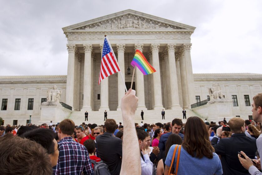 FILE - The crowd celebrates outside of the Supreme Court in Washington on June 26, 2015, after the court declared that same-sex couples have a right to marry anywhere in the US. (AP Photo/Jacquelyn Martin, File)