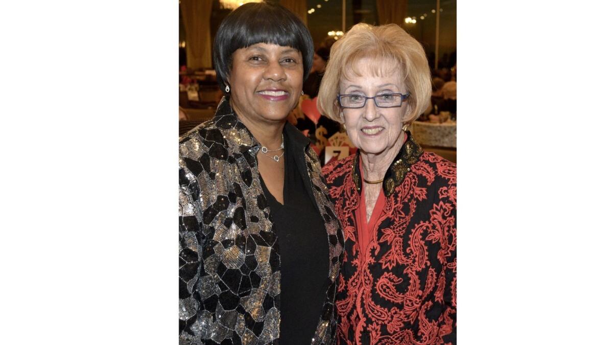 La Providencia Guild President Glenda Jones, left, and the event Chairwoman Lynn White-Shelby, welcomed members and supporters to last week's Casino Royale gala.