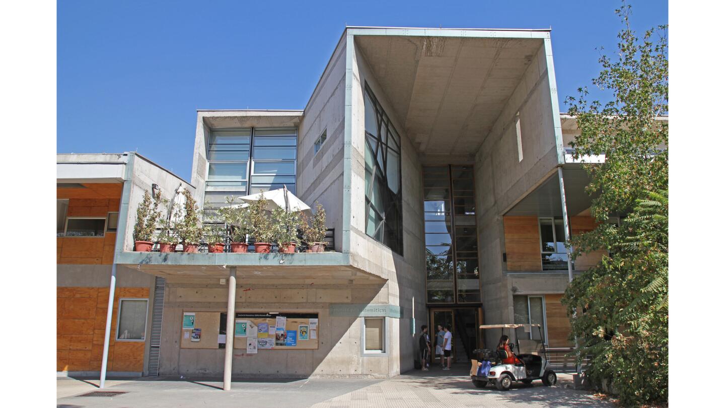 The front view of the Catholic University's School of Mathematics, designed by Alejandro Aravena, and completed in 1998. The architect's interventions united two older buildings into a single unit -- and in the process gave a blocky, modernist building some interesting angles.
