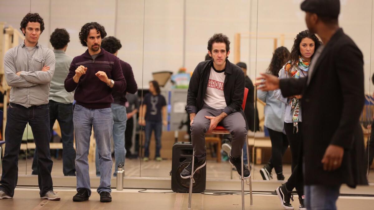 Thomas Kail, left, Alex Lacamoire, Andy Blankenbuehler and Stephanie Klemons look on during rehearsal. (The Public Theater)