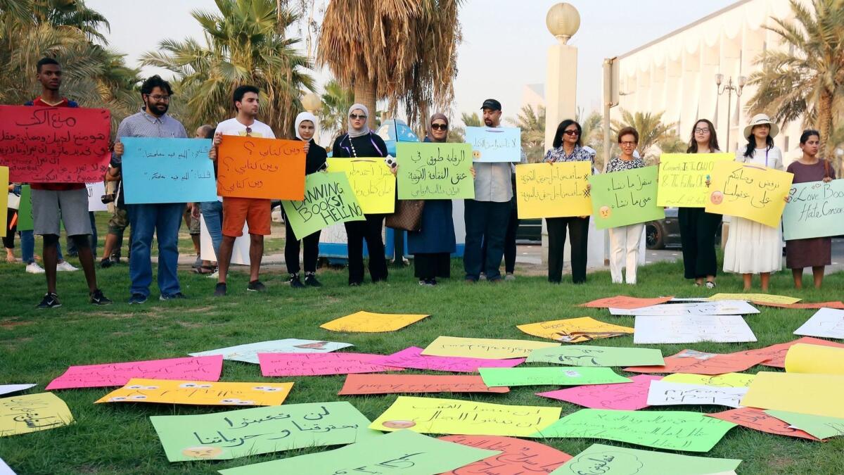 Kuwaitis gather outside the National Assembly building in Kuwait City on Sept. 15 in protest of the government's censorship on publications that resulted in the ban of many books from entering the country.