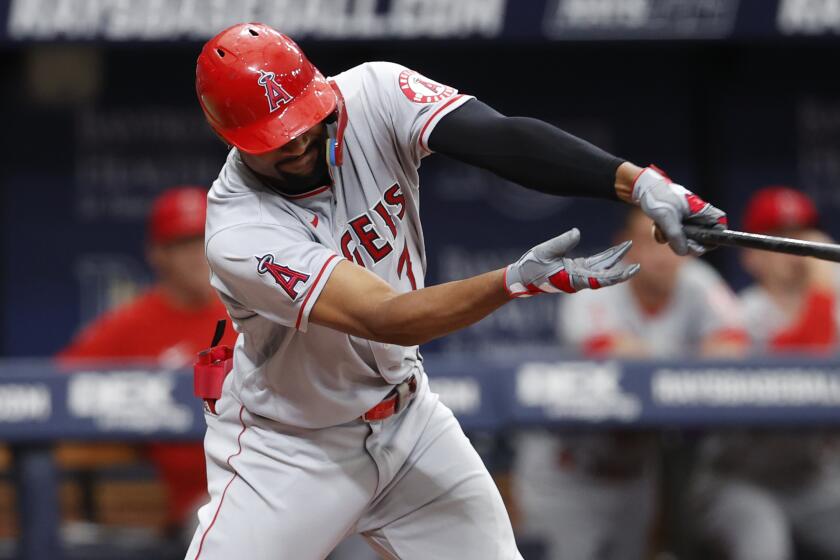 Los Angeles Angels' Jo Adell hits an RBI single to left against the Tampa Bay Rays.