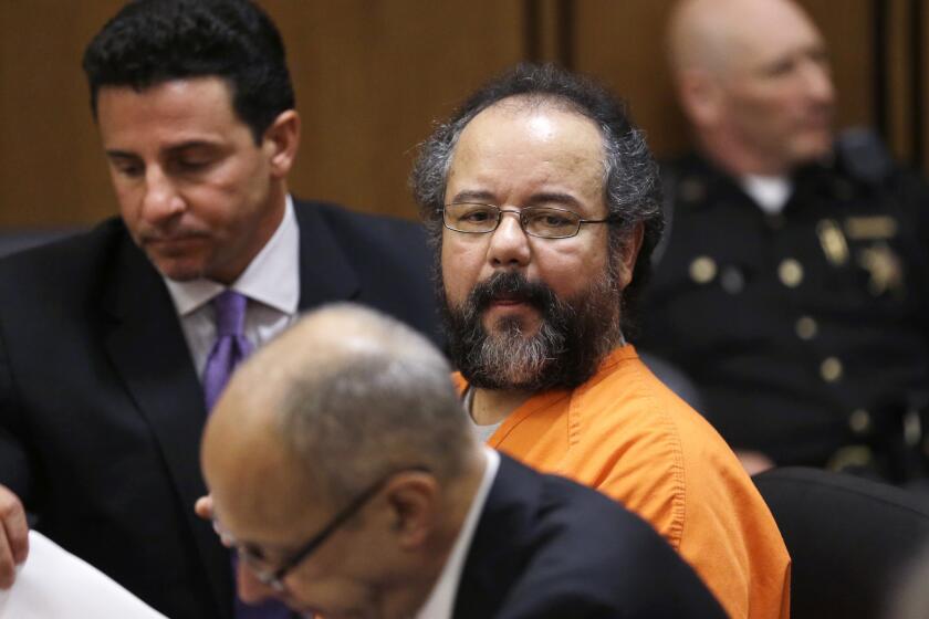 Ariel Castro looks over at the prosecutor's table during court proceedings last week.