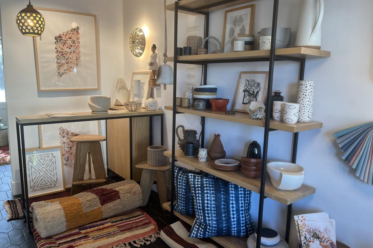 Shelves with ceramics on them 