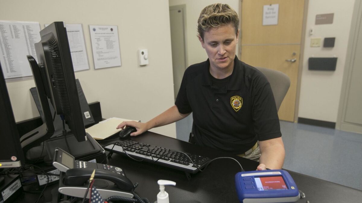 La Mesa Police Department Sgt. Katy Lynch, who is the training officer for the department, demonstrated how the TruNarc tester worked.
