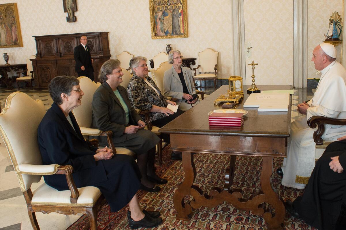 Pope Francis talks with a delegation of The Leadership Conference of Women Religious at the Vatican on April 16. The Vatican has announced the unexpected conclusion of a controversial overhaul of the main umbrella group of U.S. nuns in a major shift in tone and treatment of American nuns under the social justice-minded Pope Francis.