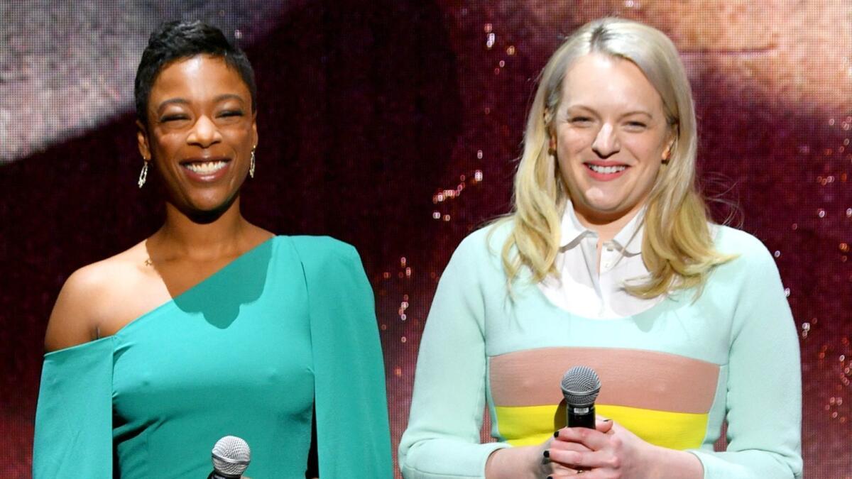 Samira Wiley, left, and Elisabeth Moss, stars of "The Handmaid's Tale," at Hulu's 2018 upfront presentation on Wednesday in New York.