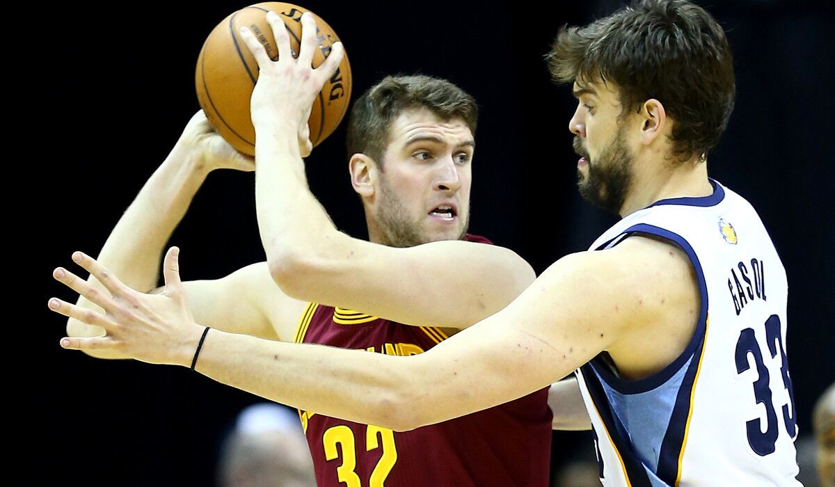 Seven-foot Spencer Hawes (32) gives the Clippers some depth at power forward and center to battle the likes of Grizzlies All-Star center Marc Gasol.