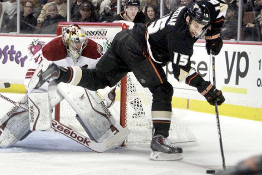 Ducks center Ryan Getzlaf backhands a puck in front of Coyotes goalie Mike Smith during Anaheim's 5-2 win over Phoenix at the Honda Center on Wednesday. Getzlaf scored his seventh goal of the season against Smith in the second period.