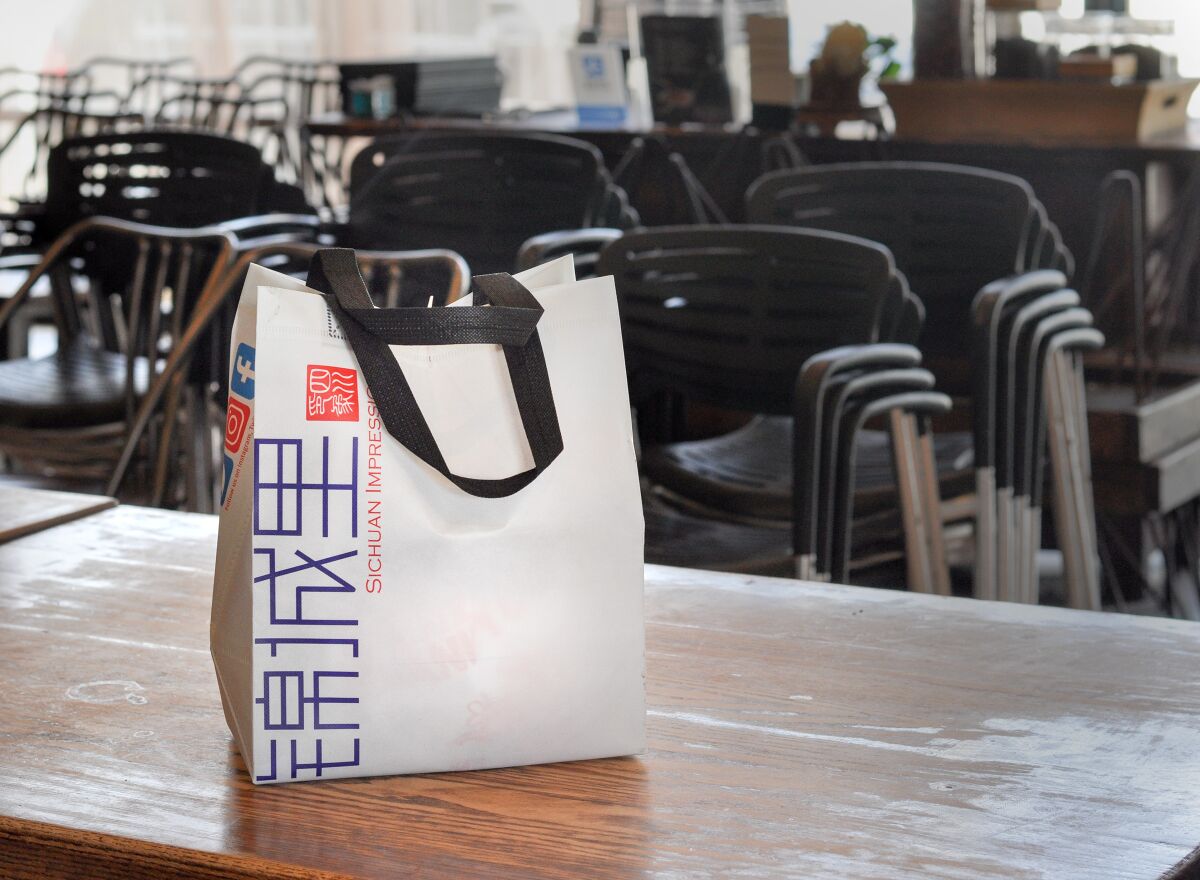 A takeout bag at Alhambra's Sichuan Impression is sealed and reusable by customers. 