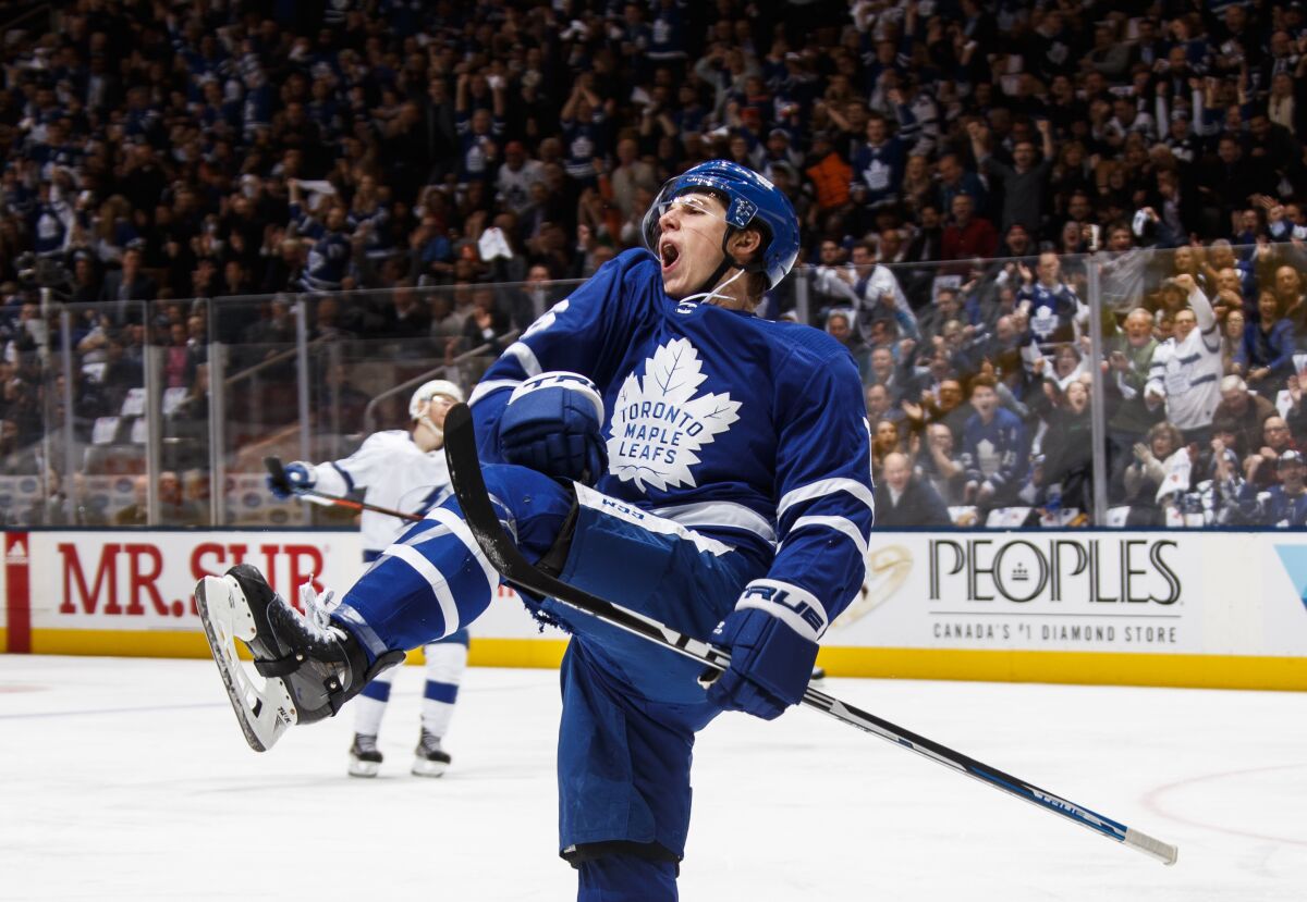 Toronto's Mitch Marner reacts after scoring a goal against Tampa Bay on April 4.
