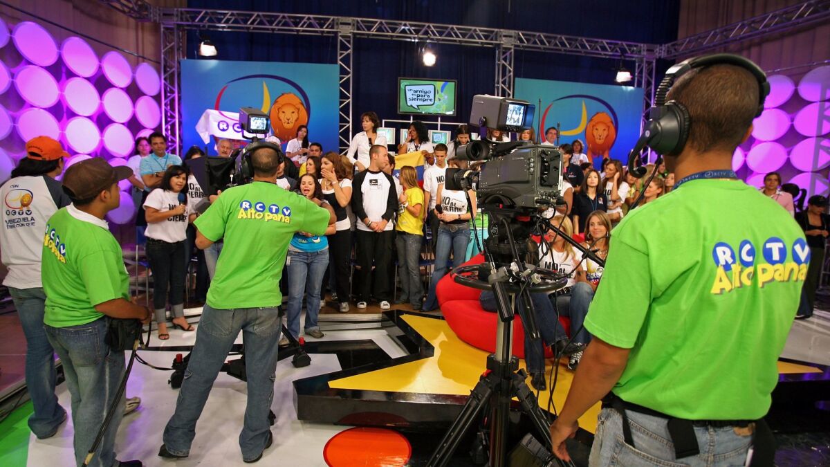 Workers for the Venezuelan private station RCTV (Radio Caracas Television) broadcast part of a special farewell program in 2007, during their last day of transmission.