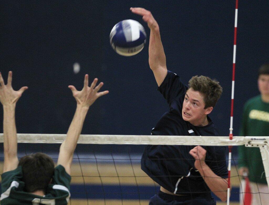 Newport Harbor High's Wyatt Walton, right, scores against Edison during a Sunset League match on Tuesday.