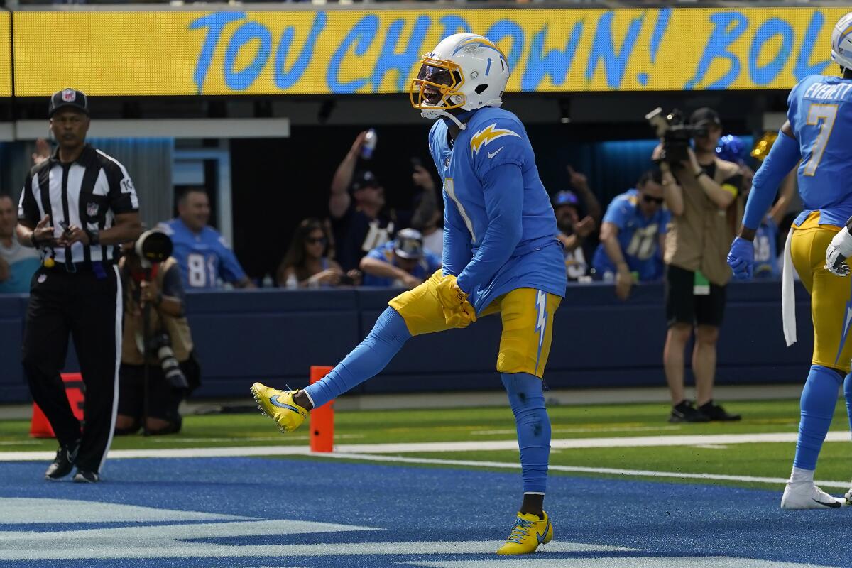 Los Angeles Chargers wide receiver DeAndre Carter celebrates after scoring against the Las Vegas Raiders during the first half of an NFL football game in Inglewood, Calif., Sunday, Sept. 11, 2022. (AP Photo/Gregory Bull)