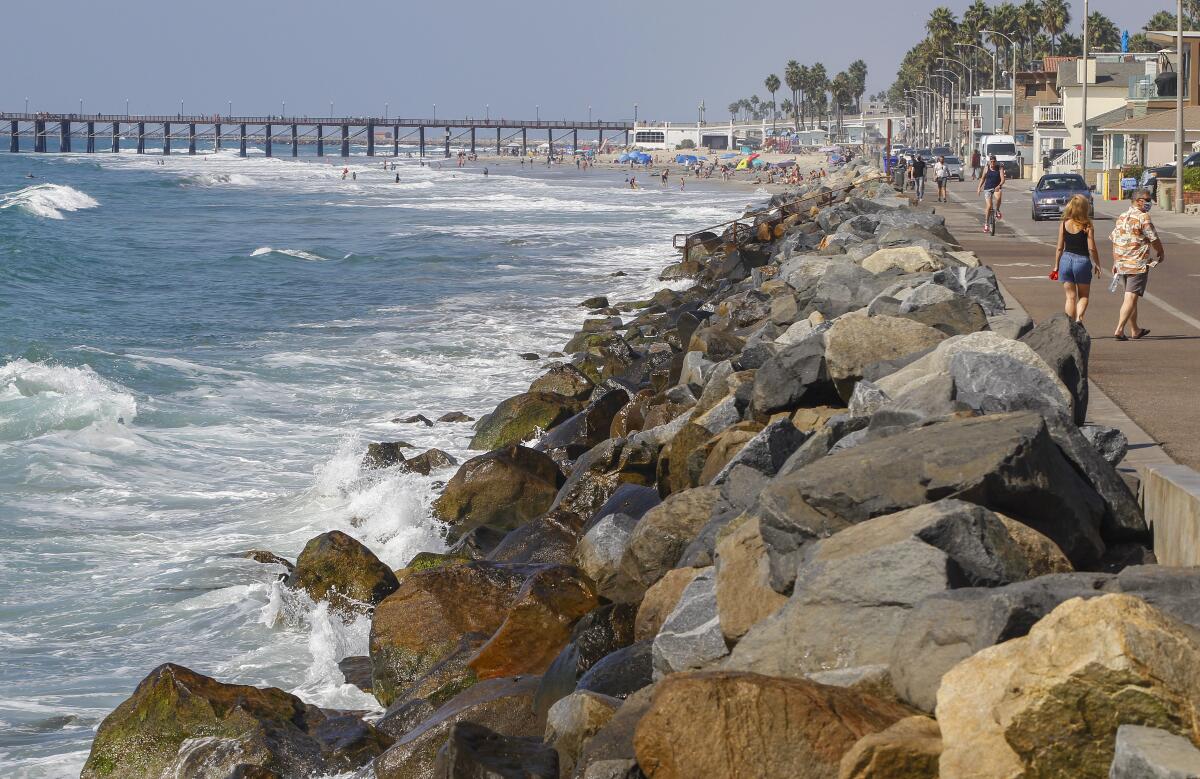 Wave crash on the rock revetment at Wisconsin Avenue along The Strand South in Oceanside in October 2020.
