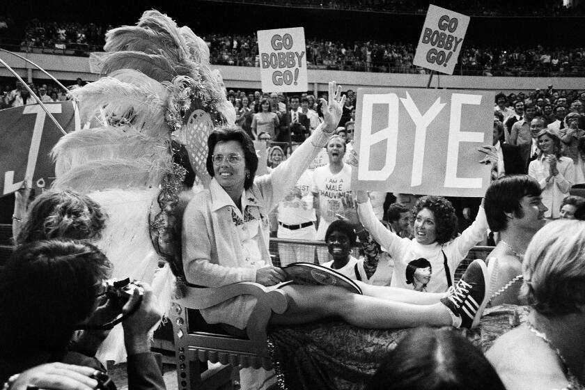 FILE - In this Sept. 20, 1973, file photo, . Billie Jean King waves to crowds at the Astrodome in Houston.