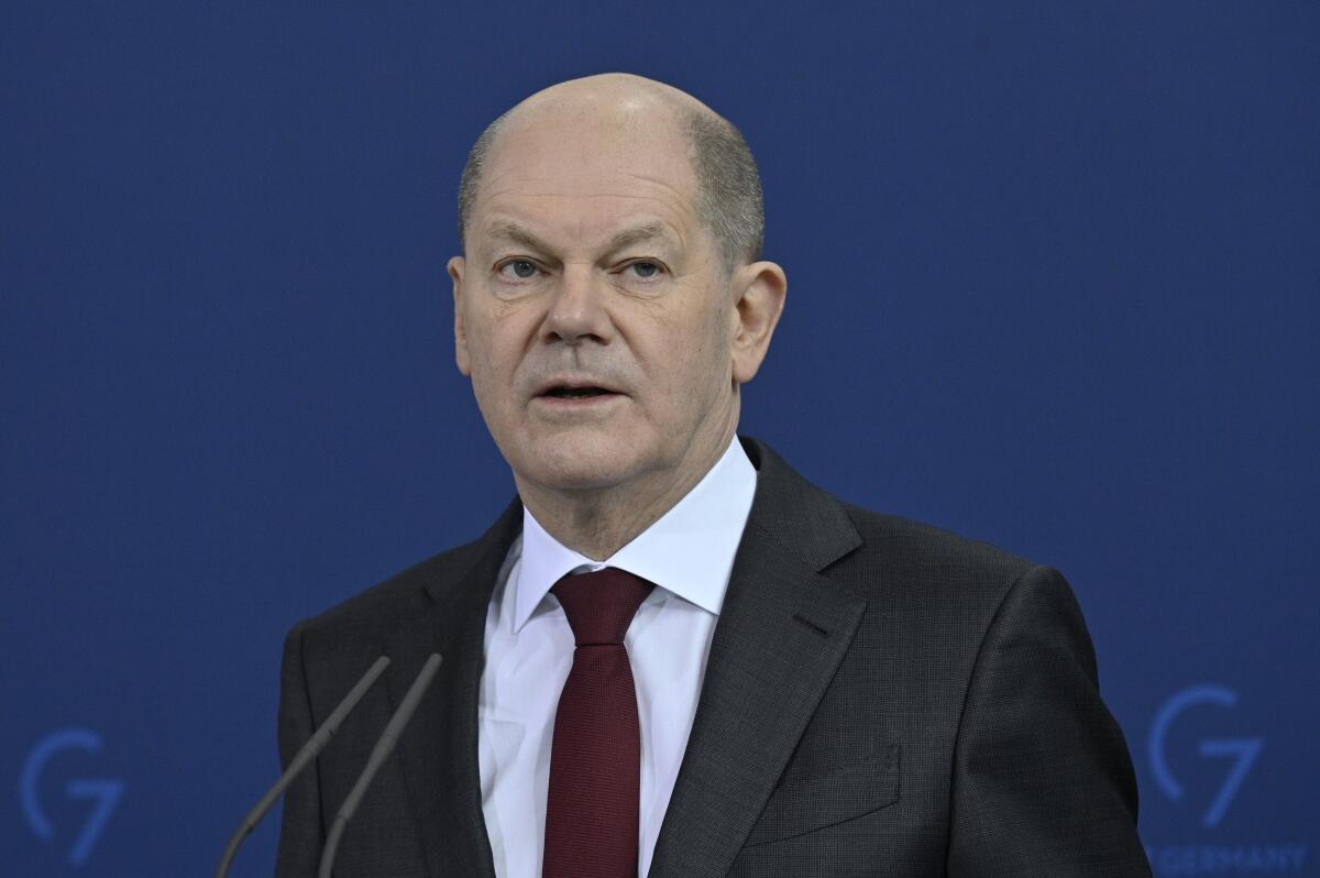 German Chancellor Olaf Scholz says his government cannot afford to immediately cut off of Russian oil and natural gas.