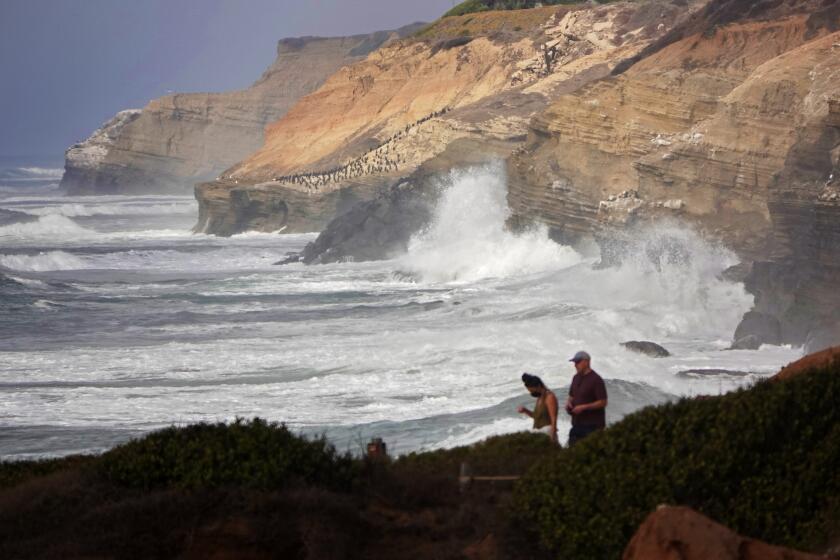 SAN DIEGO, CA - JANUARY 18: People walk to the tide pools at Cabrillo National Monument on Monday, Jan. 18, 2021 in San Diego, CA. (K.C. Alfred / The San Diego Union-Tribune)