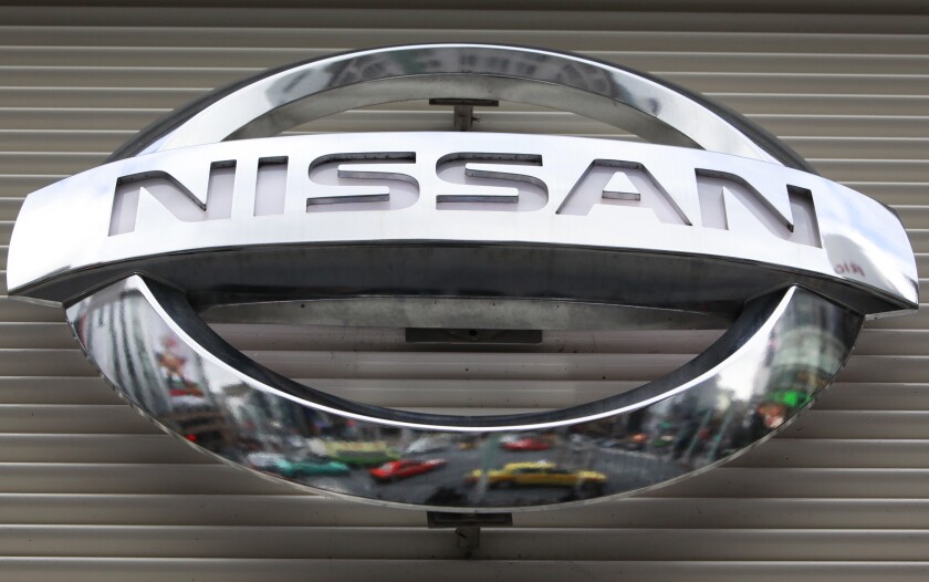 FILE - In this Wednesday, Feb. 8, 2012, file photo, the logo of the Nissan Motors Co. is shown a showroom in Tokyo's Ginza shopping district. Nissan is recalling more than 793,000 small SUVs in the U.S. and Canada, Wednesday, Jan. 26, 2022, because water can get into wiring and in rare cases could start a fire. The recall covers Nissan Rogue SUVs from the 2014 through 2016 model years. (AP Photo/Shizuo Kambayashi, File)