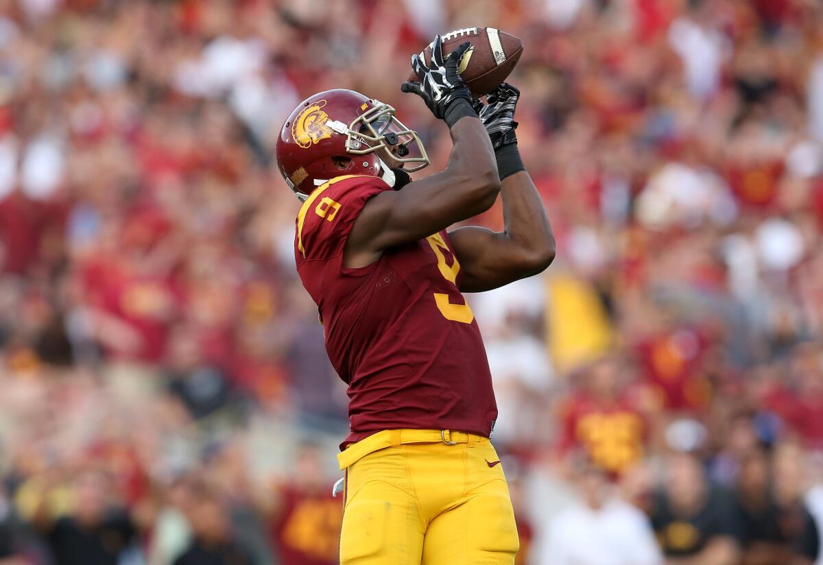 JuJu Smith-Schuster catches a touchdown pass Sept. 12 against Idaho.